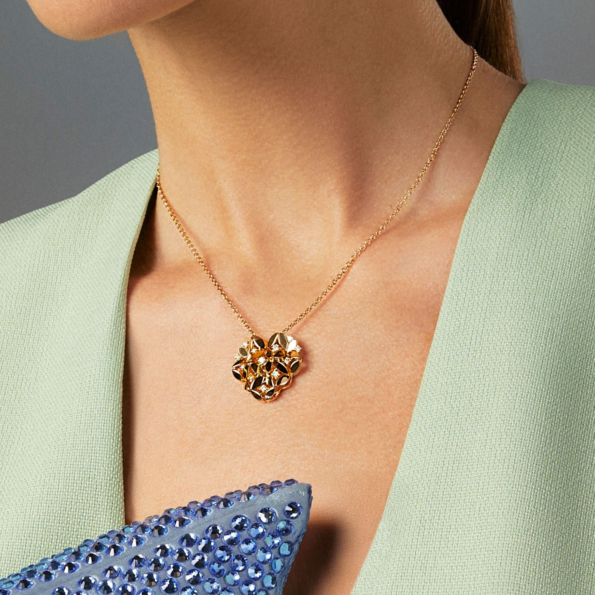 RIFLESSI YELLOW GOLD PENDANT